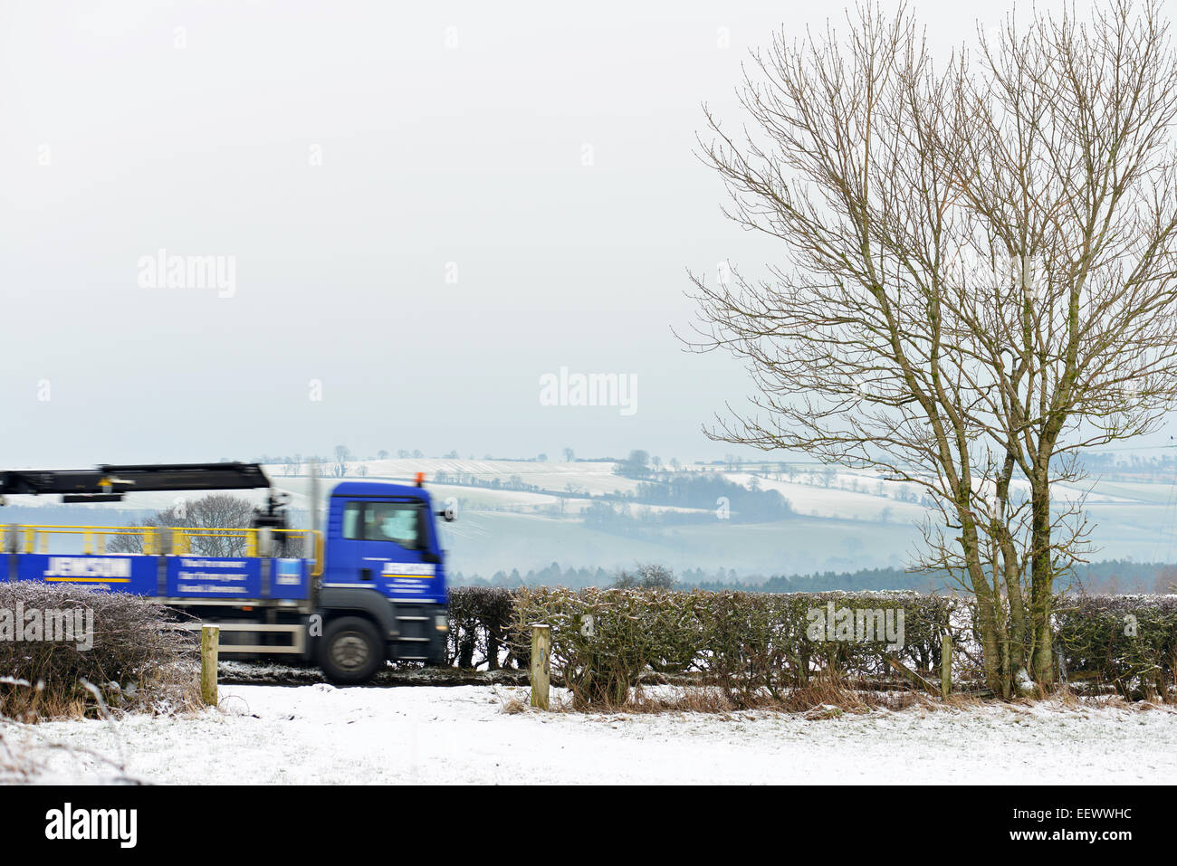 Whashton Green, North Yorkshire, UK. 22nd January, 2015. UK Weather:  A van is driven along a quiet road in North Yorkshire where freezing fog and black ice make driving hazardous. © Robert Smith/Alamy Stock Photo