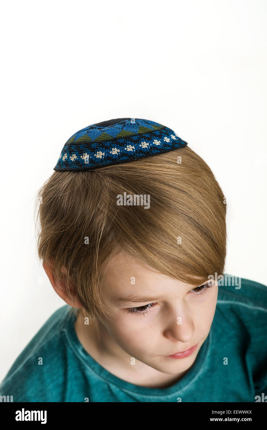 studio portrait of white boy with Jews kipa or yarmulke Stock Photo - Alamy