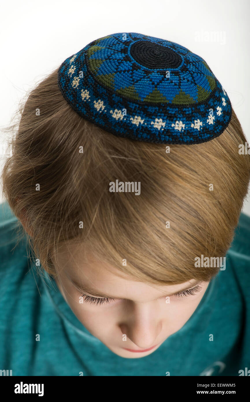 studio portrait of white boy with Jews kipa or yarmulke Stock Photo - Alamy