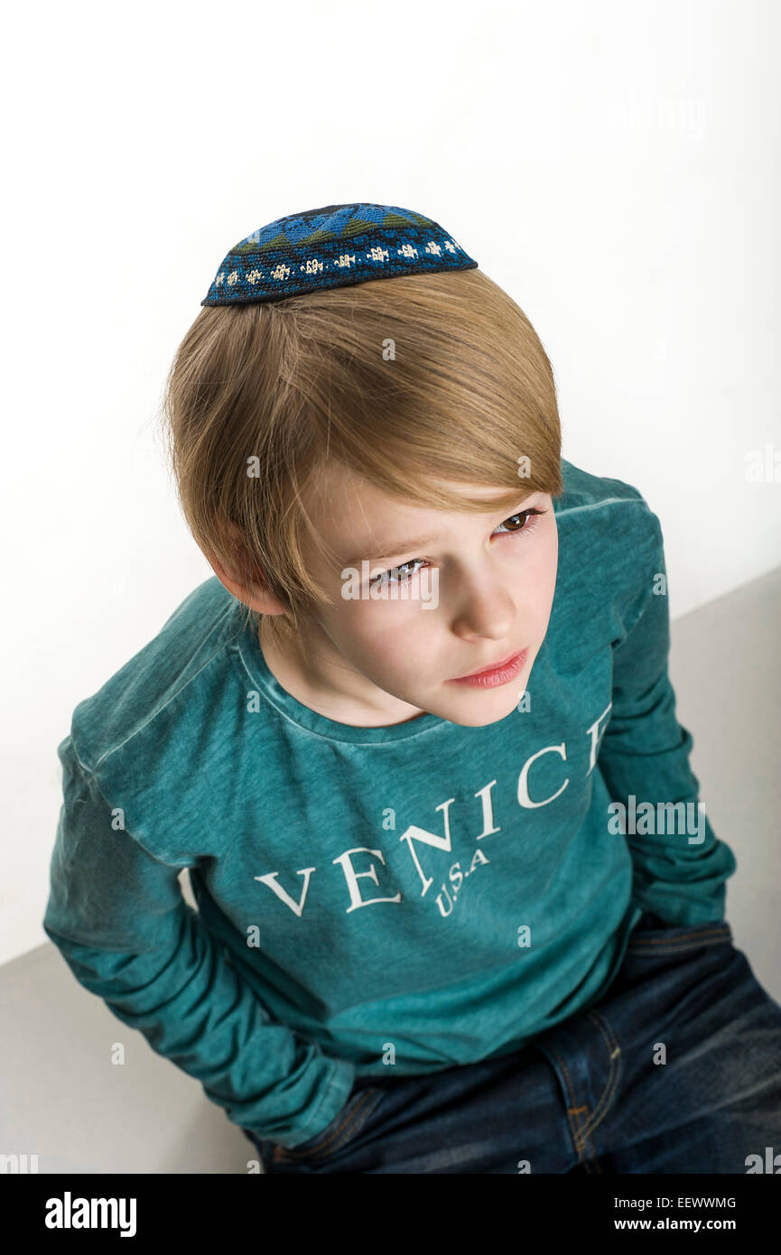 studio portrait of white boy with Jews kipa or yarmulke Stock Photo - Alamy