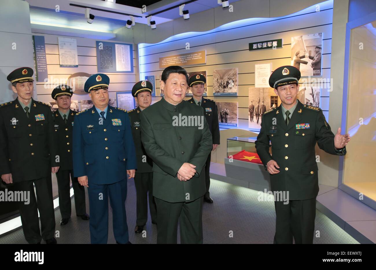 Beijing, China's Yunnan Province. 21st Jan, 2015. Chinese President Xi Jinping (2nd R, front), also general secretary of the Communist Party of China (CPC) Central Committee and chairman of the Central Military Commission, listens to the introduction of military history as he visits a military base of the second artillery corps in Kunming, capital city of southwest China's Yunnan Province, Jan. 21, 2015. © Li Gang/Xinhua/Alamy Live News Stock Photo