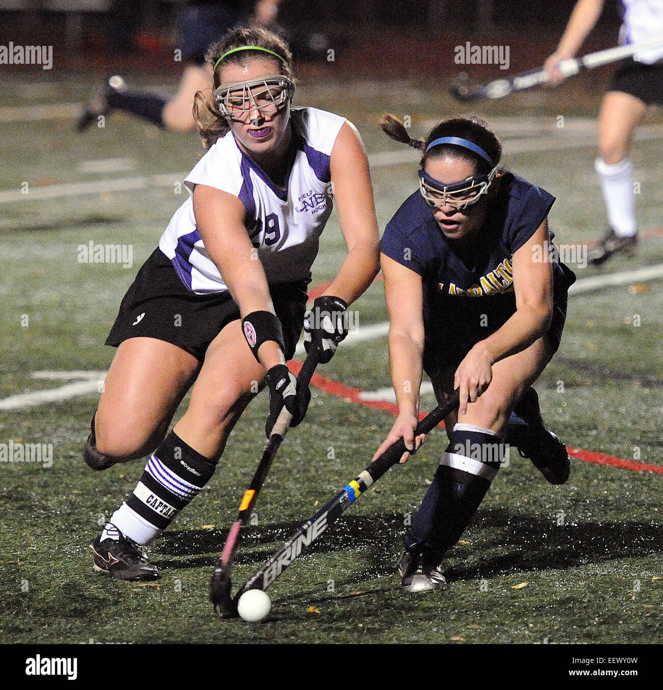 Guilford, CT USA-- North Branford's Meagan Halligan, left, and Lauralton Hall's Christina Gould battle for a midfield ball during the first half .     11/15/11 Stock Photo