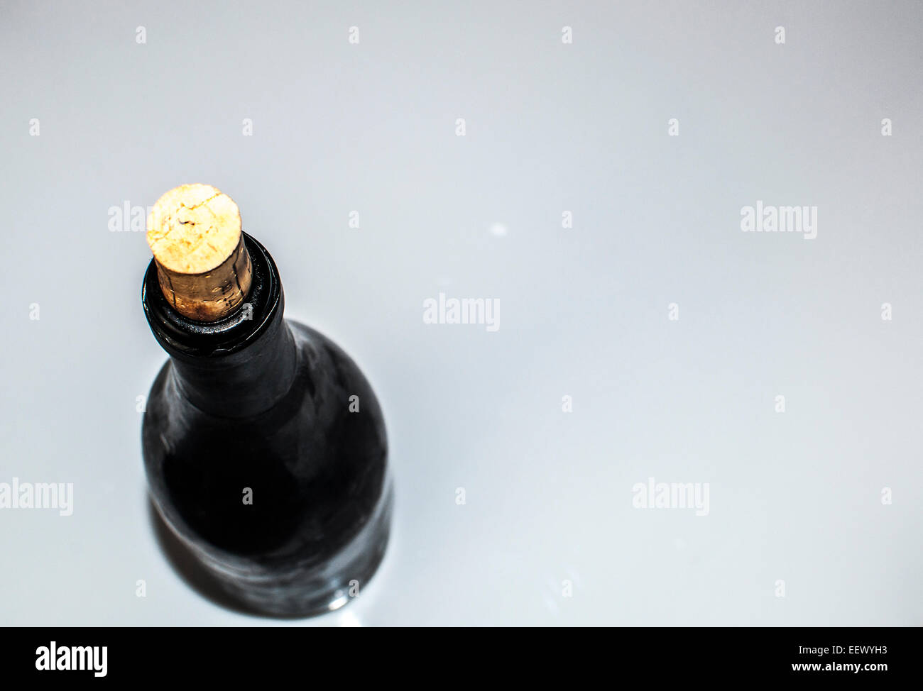 Old bottle on white background Stock Photo - Alamy