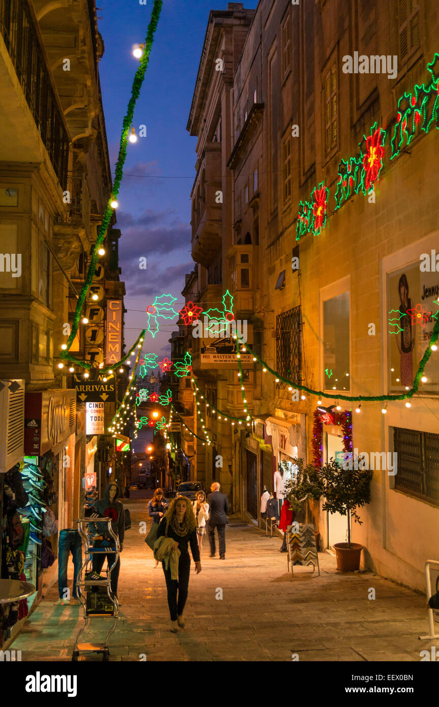 Christmas decorations and shoppers in old town Valletta Malta EU Europe