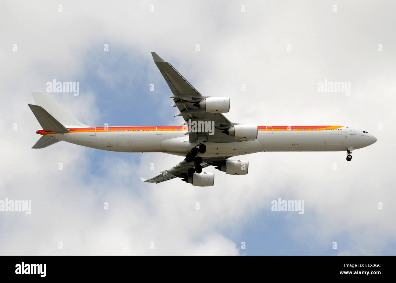 Modern passenger jet airplane in mid flight Airbus A-340 Stock Photo