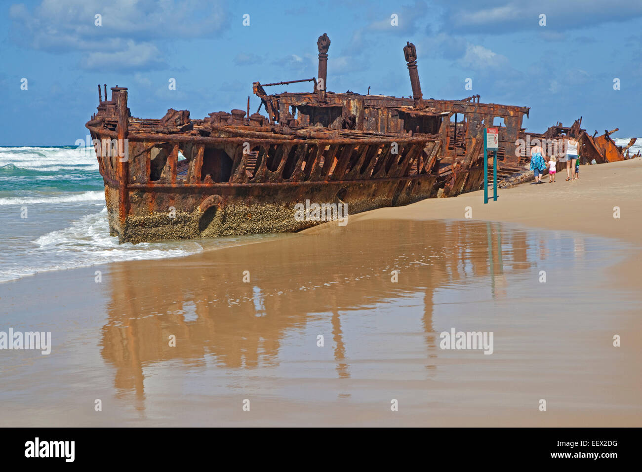 Rusty hulk of the New Zealand hospital ship SS Maheno shipwreck on Fraser Island, Hervey Bay, Queensland, Australia Stock Photo