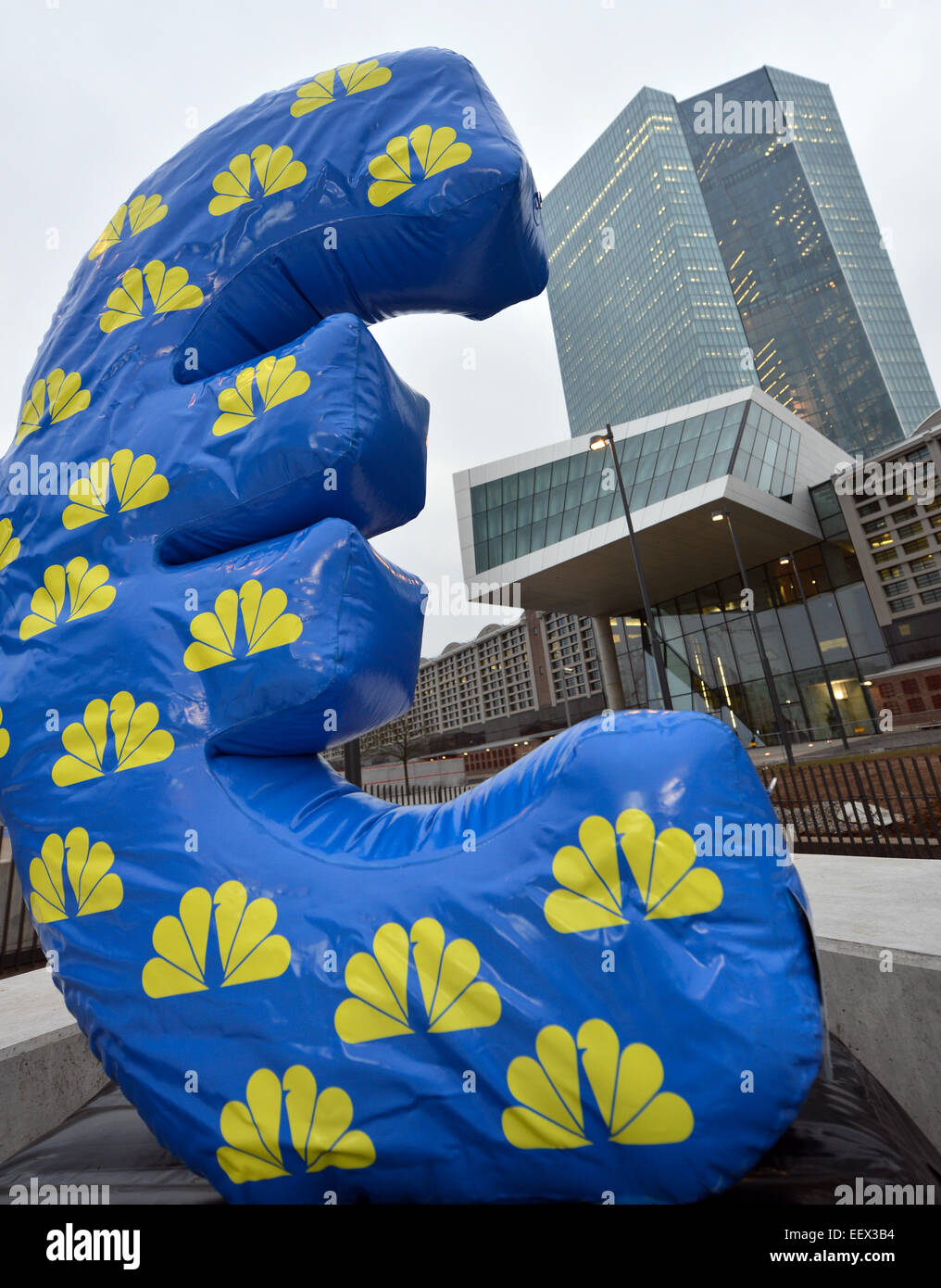 An inflated Euro sign of the news channel CNBC is placed in front of ...