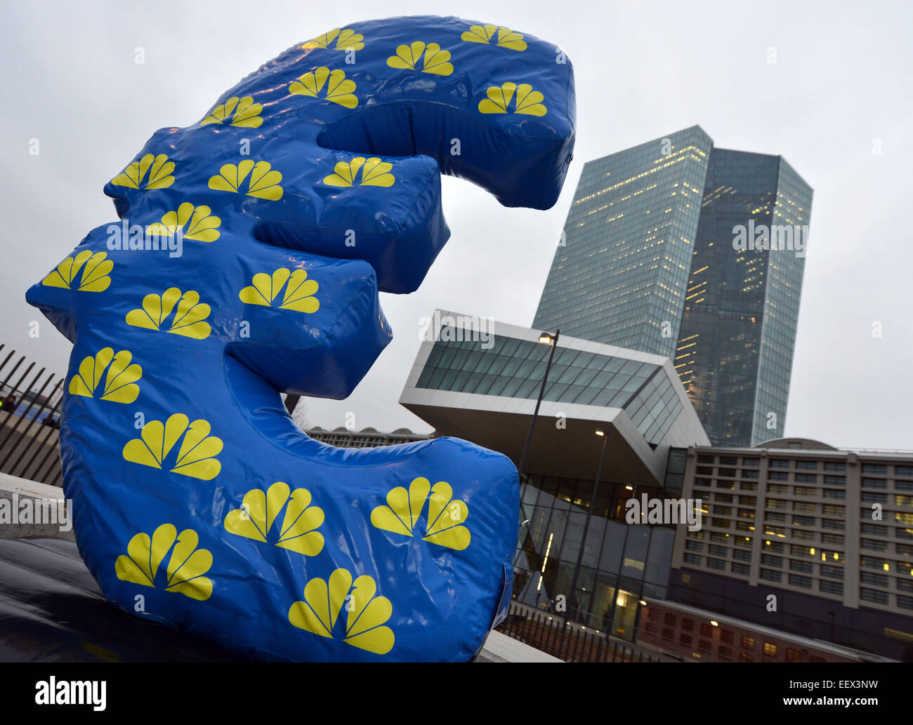 An inflated Euro sign of the news channel CNBC is placed in front of ...