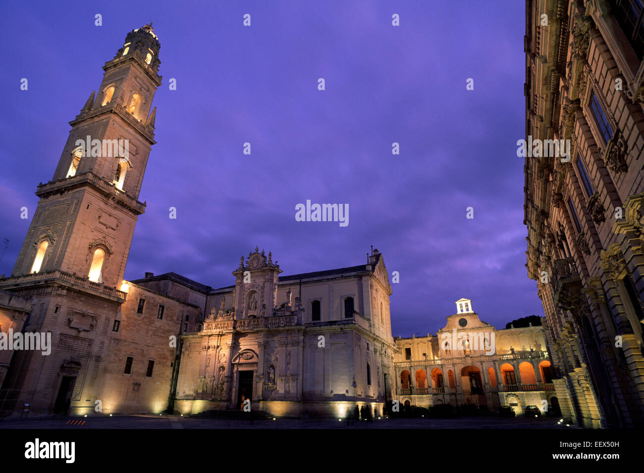 Italy, Puglia, Lecce, Piazza del Duomo, cathedral and bishop palace at night Stock Photo