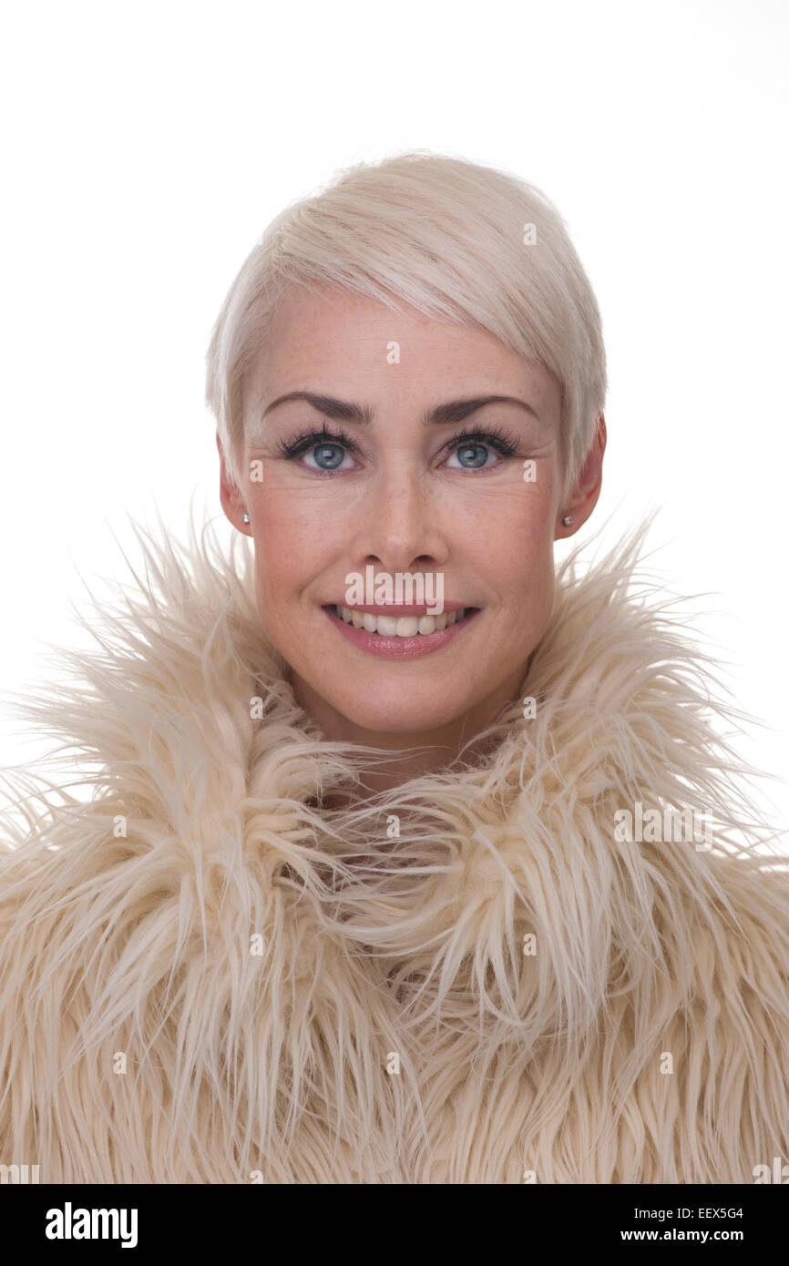 mature woman female model with short blonde hair headshot Stock Photo