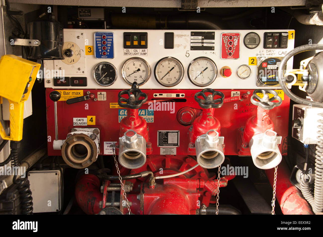 Fire Engine Truck Rear Pump House Water outlet Stock Photo