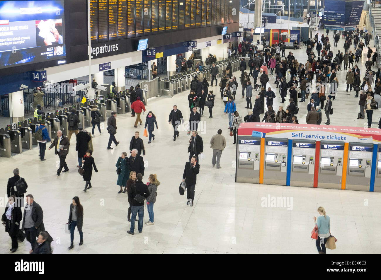London waterloo railway station and its busy commuters on the concourse waiting for trains,England,UK Stock Photo