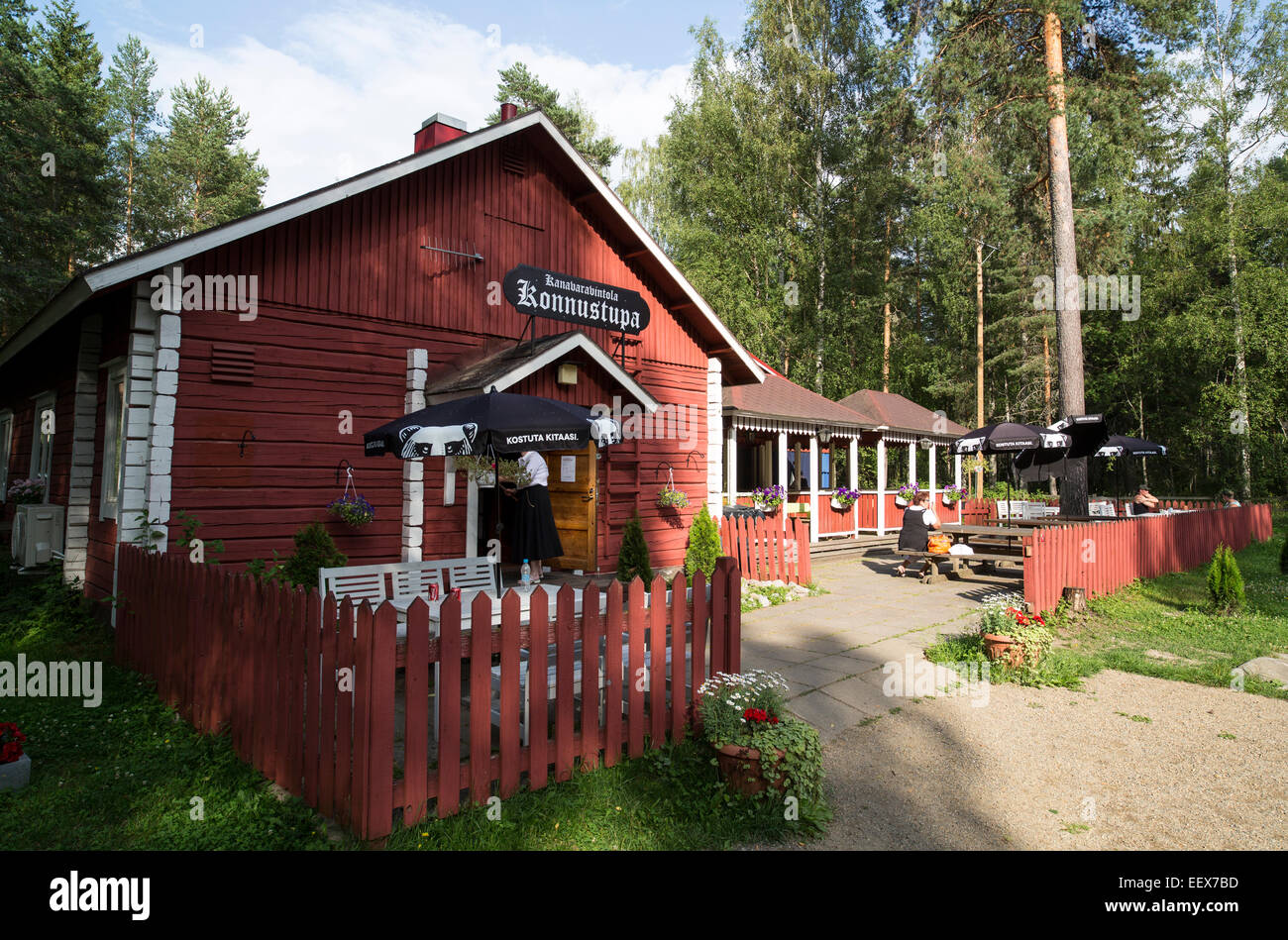 Old Log Cabin Serving As Small Summertime Restaurant For Tourists