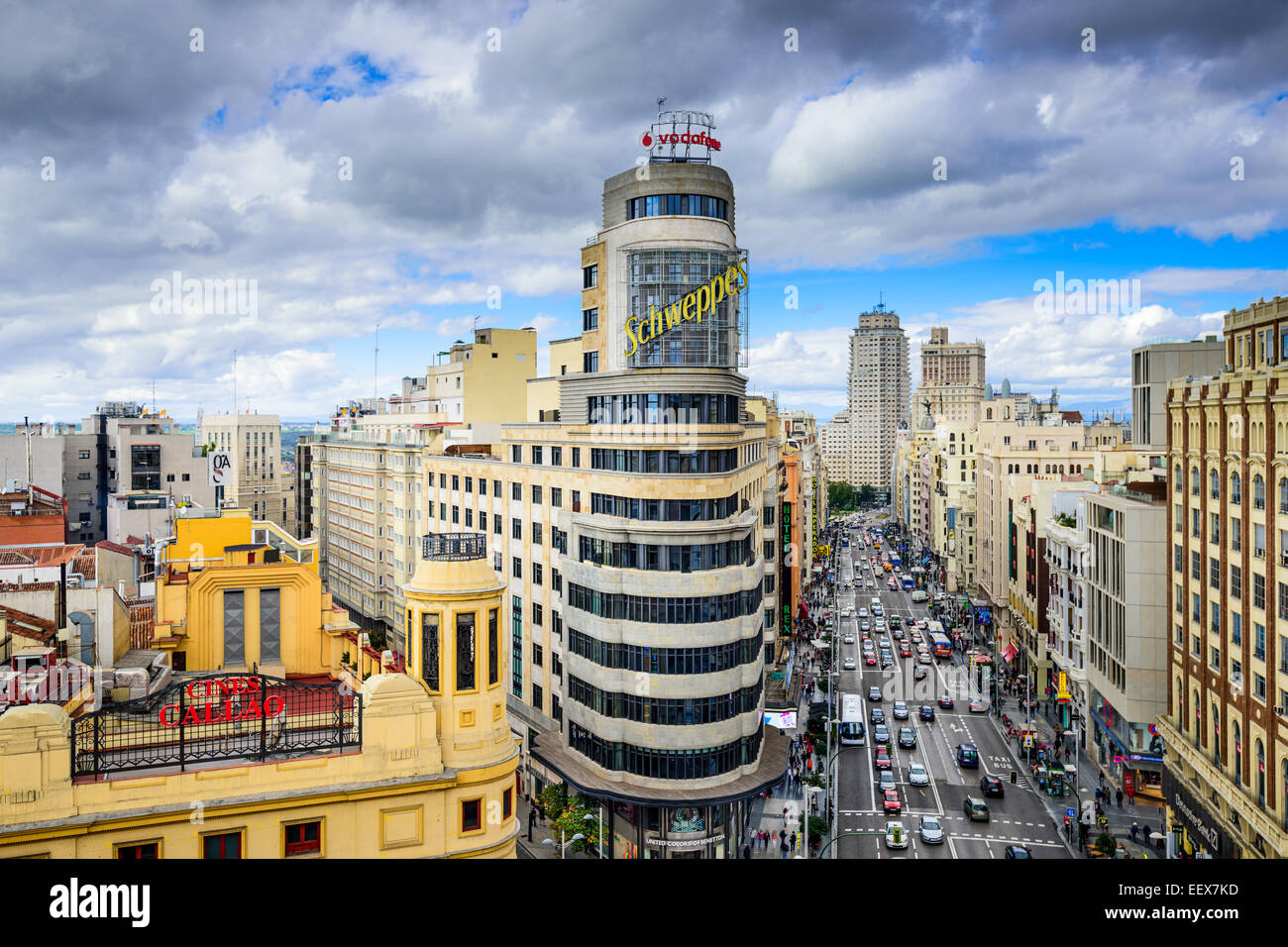 Gran Via at the Iconic Schweppes sign in Madrid. The street is the main shopping district of the city. Stock Photo