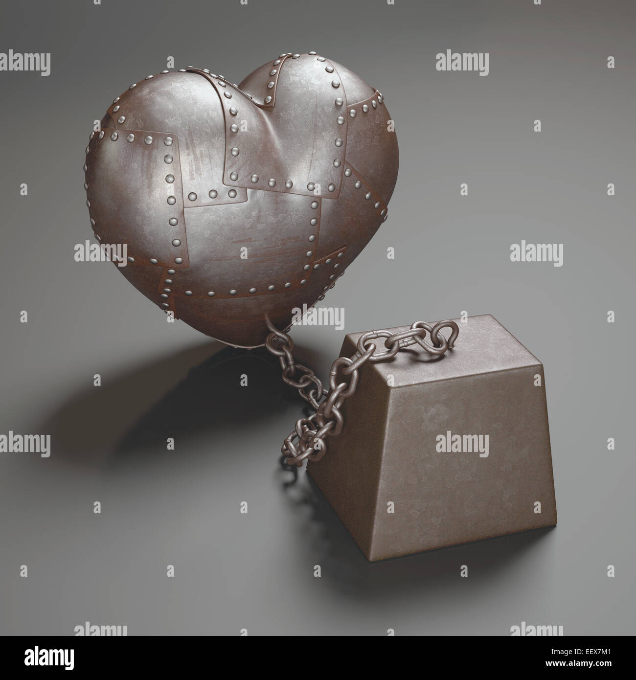 Coated steel heart attached to chains. Clipping path included. Stock Photo