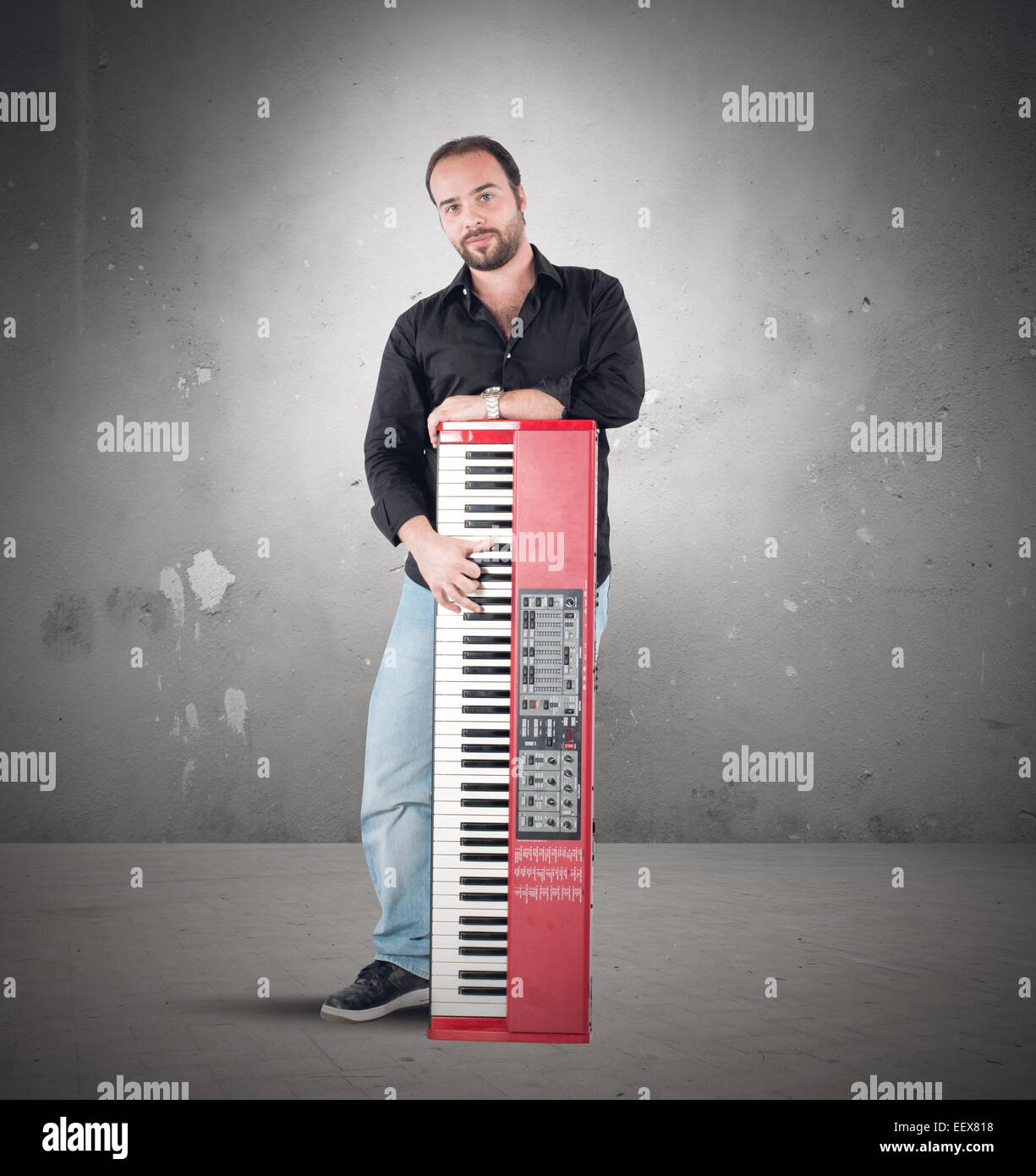 Musician and piano Stock Photo