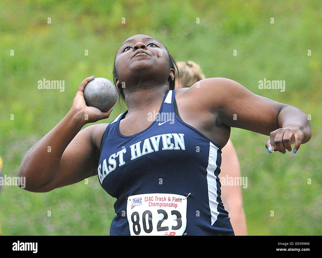 CT USA East Haven's Destiny Coward throws the shot-put during the State Open Track and Field Championship at Middletown High School. Stock Photo