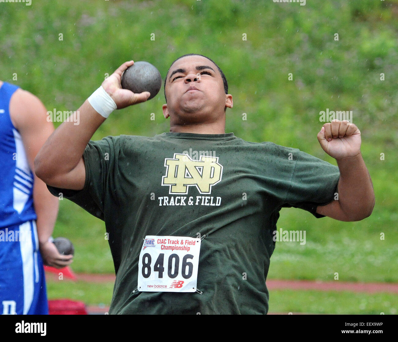 Notre Dame's Damon Taylor got a personal best with this shot-put (49'6') at the State Open Track and Field Championship at Middletown High School.  CT USA Stock Photo