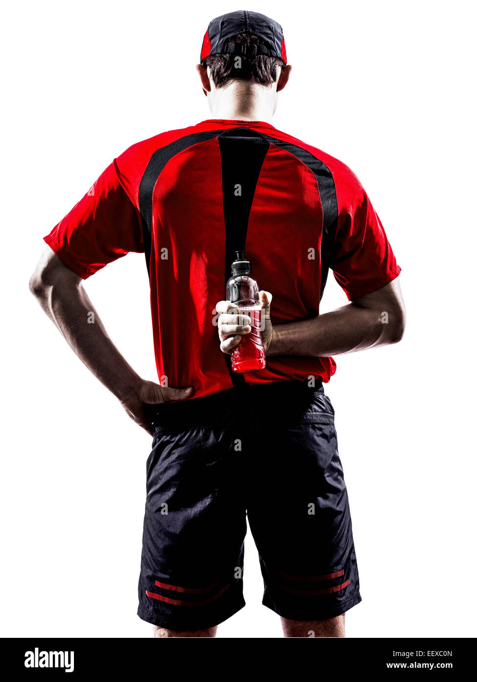 one young man runners athletes drinking energy drinks in silhouette