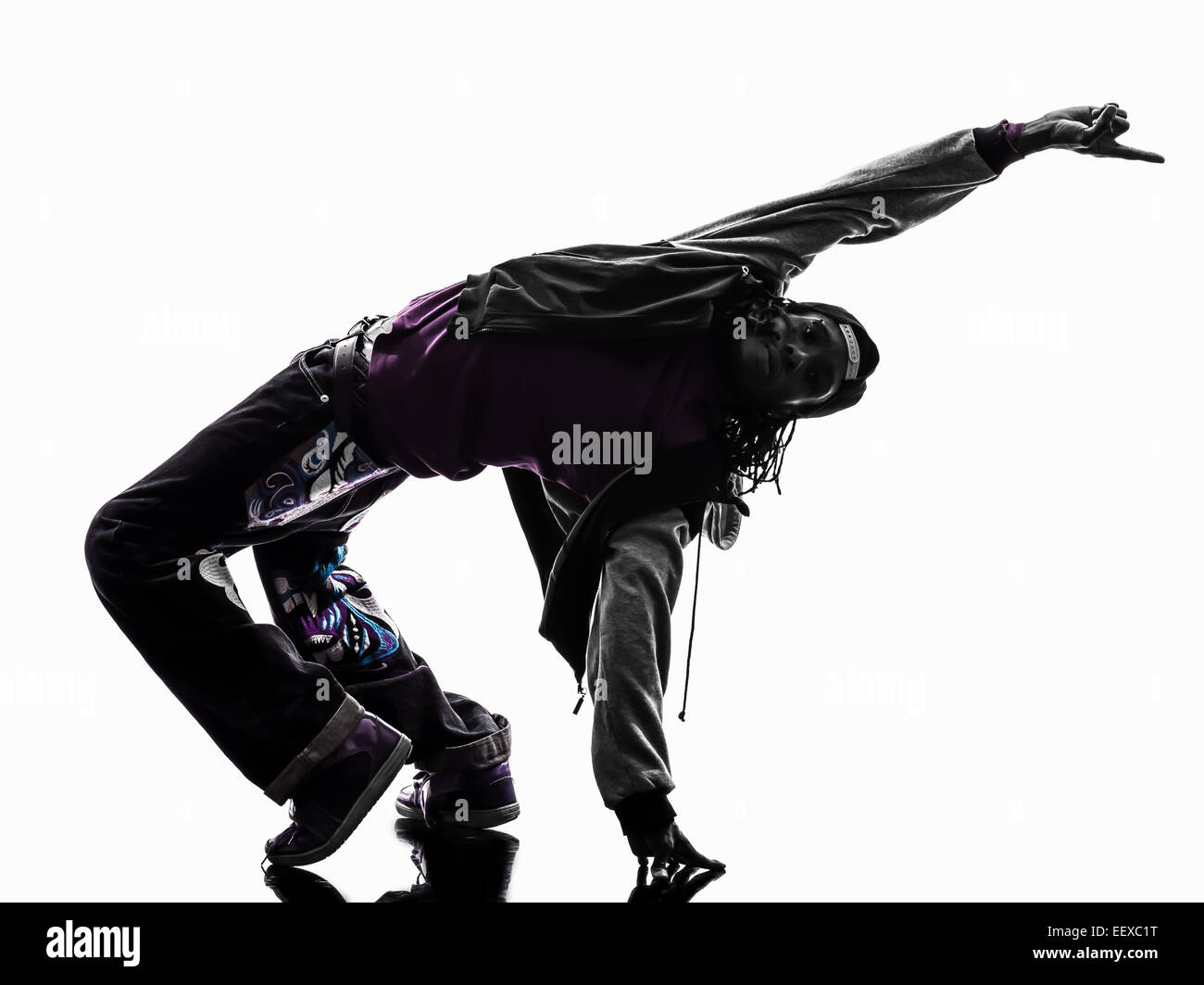 one hip hop acrobatic break dancer breakdancing young man handstand silhouette white background Stock Photo