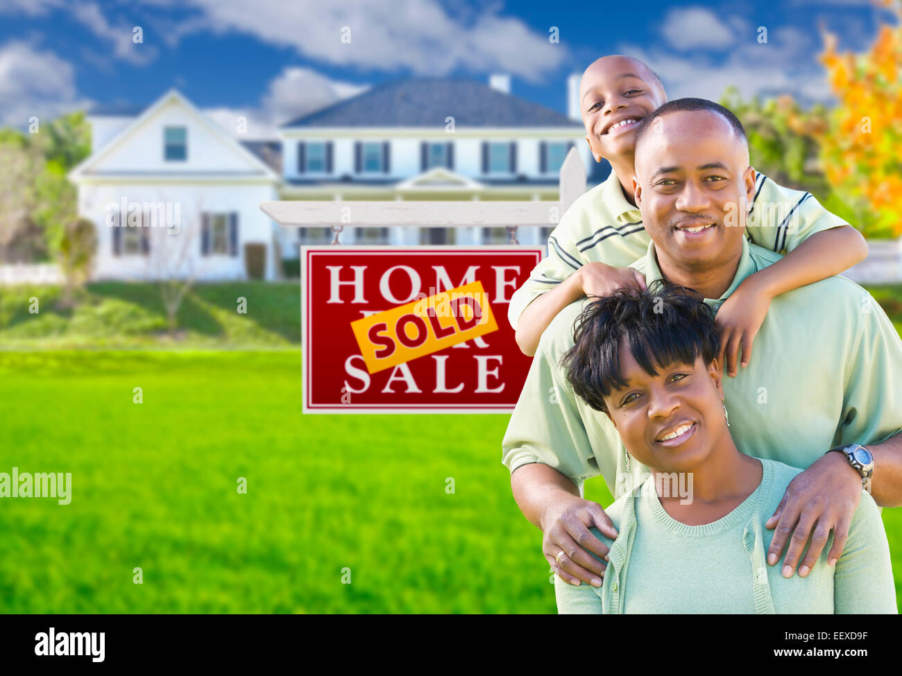 Happy African American Family In Front of Sold For Sale Real Estate ...