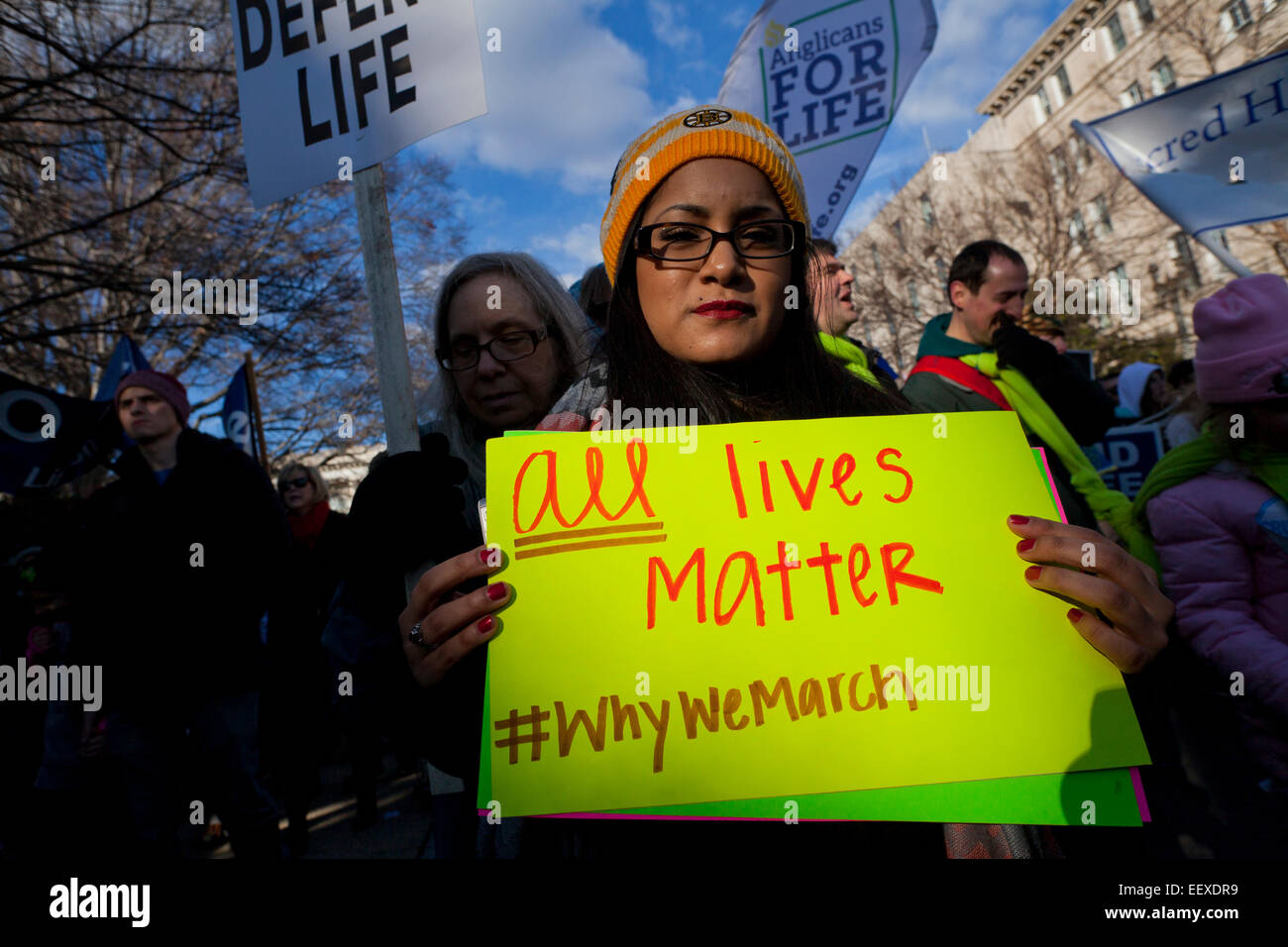 Washington DC, USA. 22nd Jan, 2015. Pro-Life supporters march carrying signs toward the Supreme Court building. Credit:  B Christopher/Alamy Live News Stock Photo