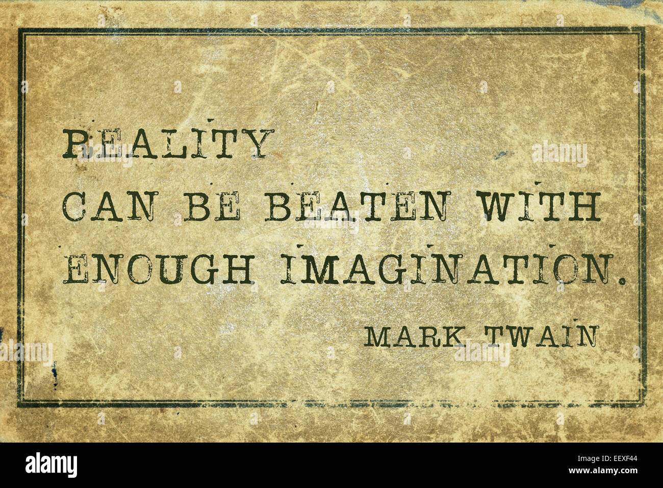 reality can be beaten with enough imagination - famous Mark Twain quote printed on grunge vintage cardboard Stock Photo