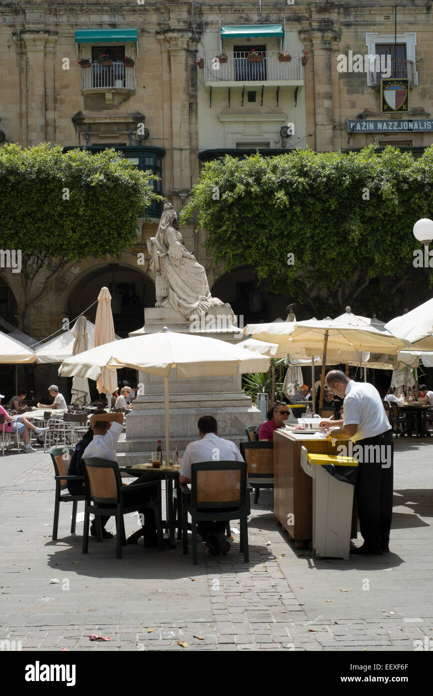 Cafes and restaurants at Queen's Square in Valletta, Malta Stock Photo