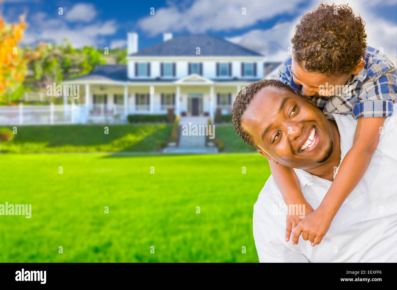 Happy Playful African American Father and Mixed Race Son In Front of ...