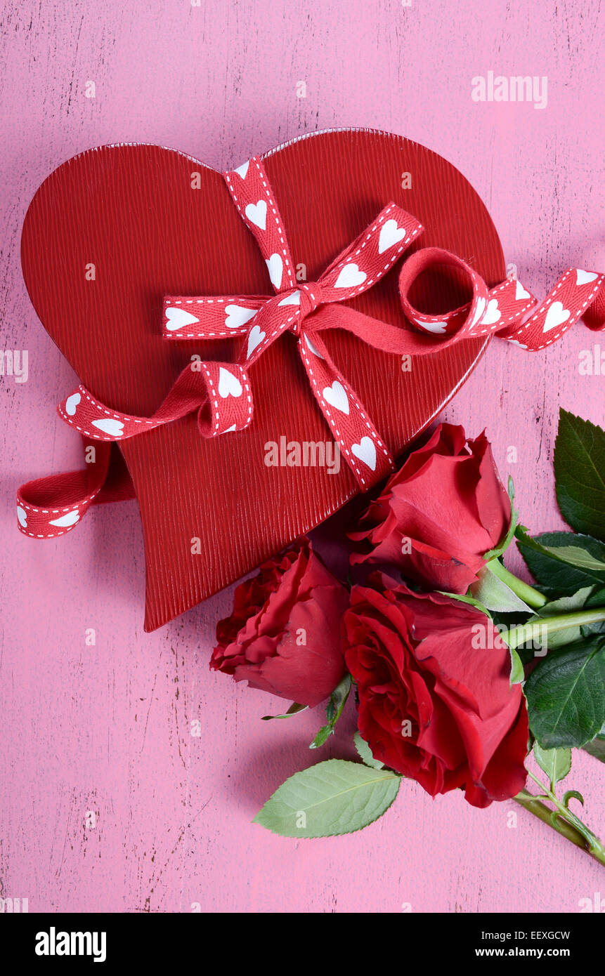 Happy Valentines Day red heart shape gift box with red roses on shabby ...