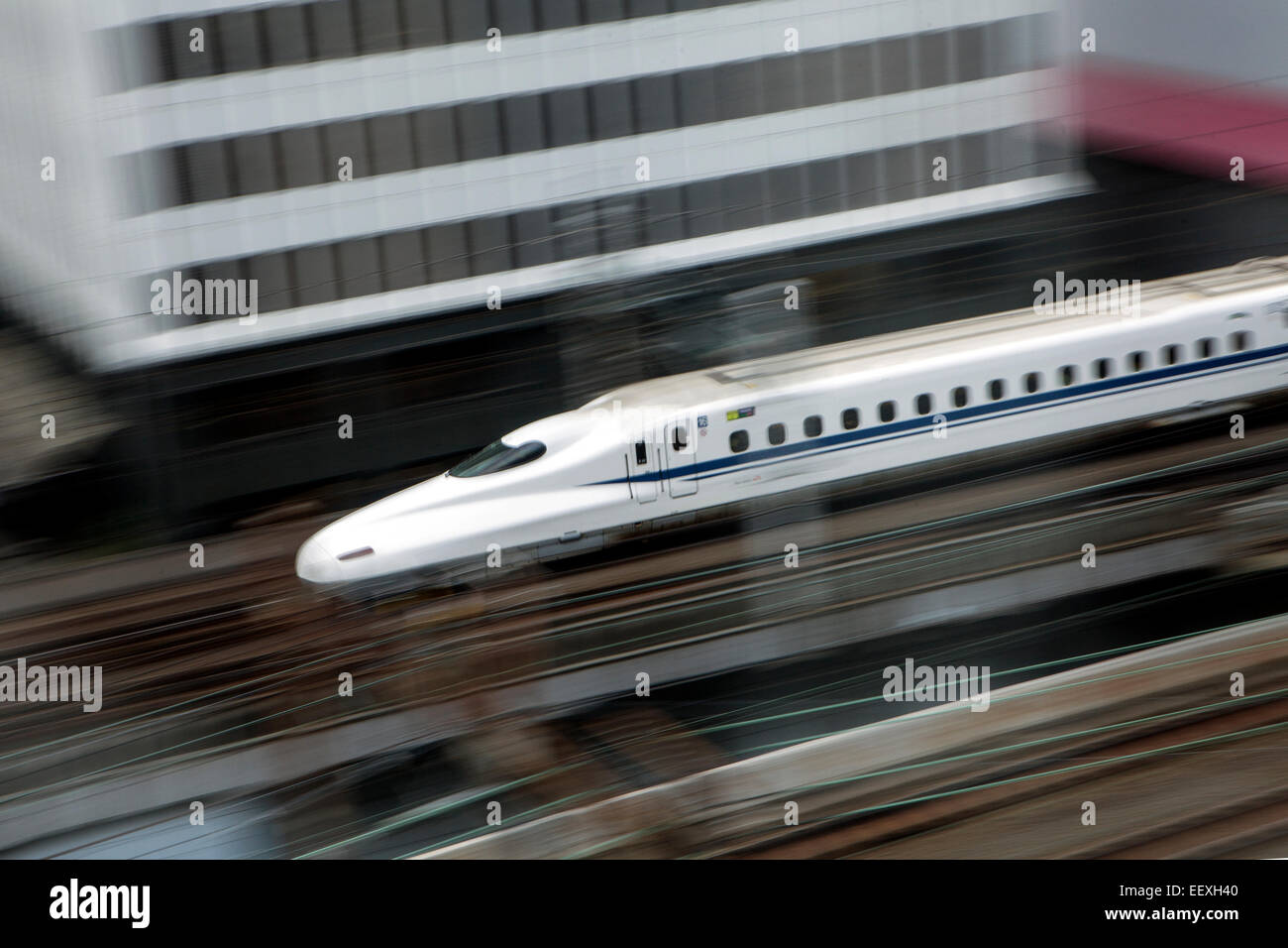 Speeding Shinkansen train Stock Photo