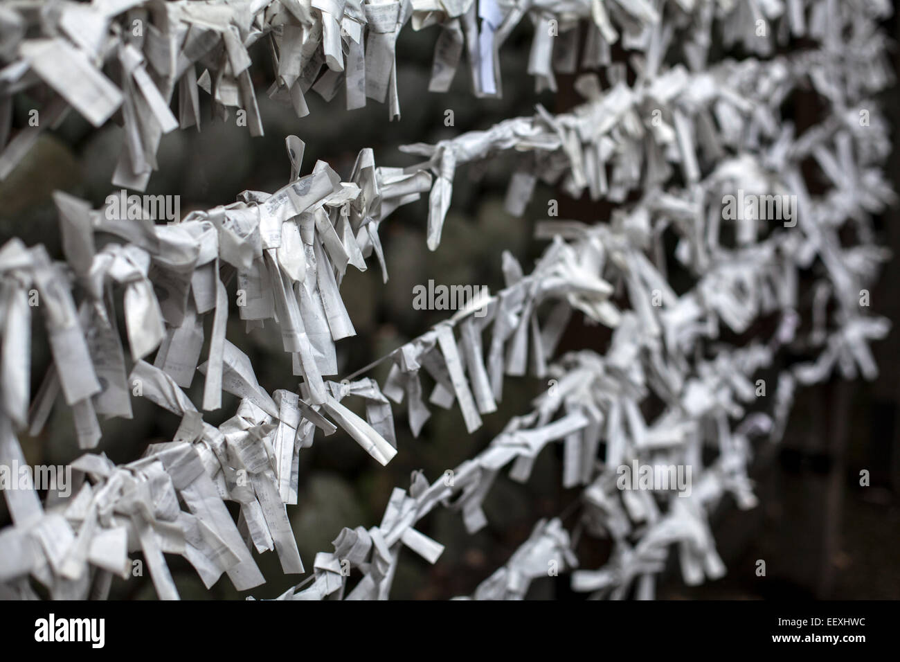 prayers tied to a fence in japan Stock Photo