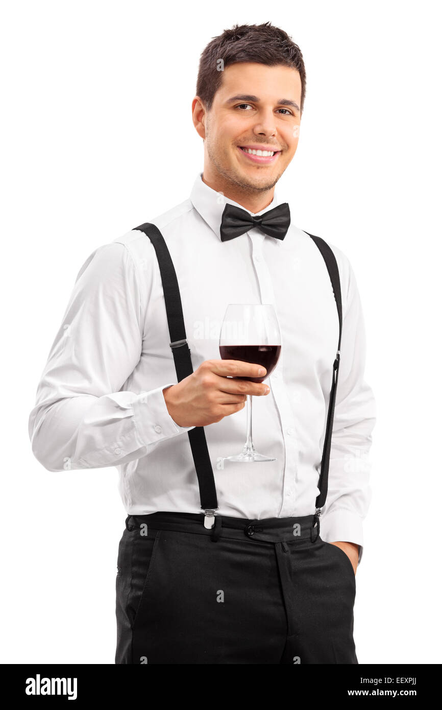 Handsome young guy drinking red wine isolated on white background Stock Photo