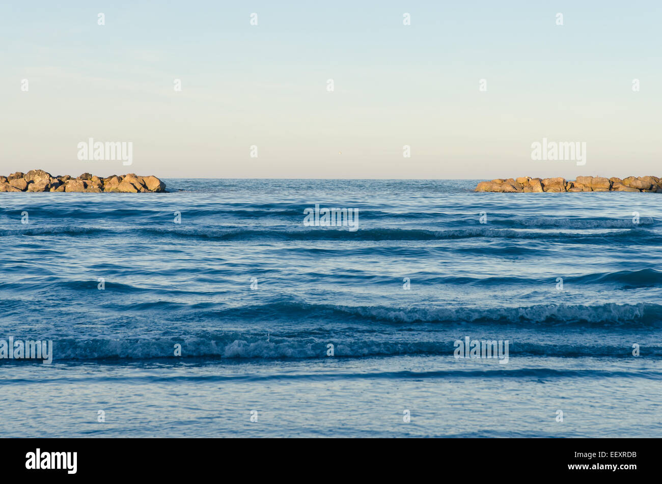 Blue ocean, winter sunset, waves of time. Stock Photo