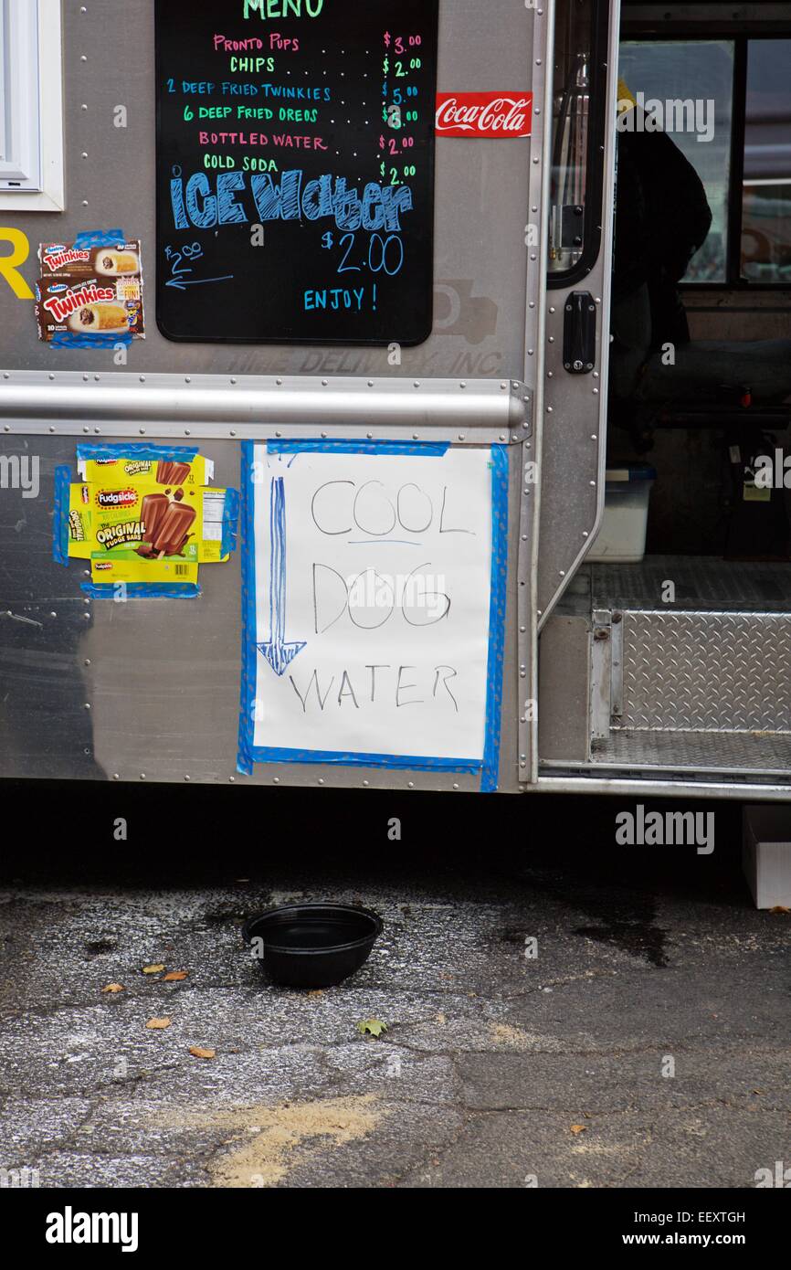 A food truck providing water for dogs Stock Photo
