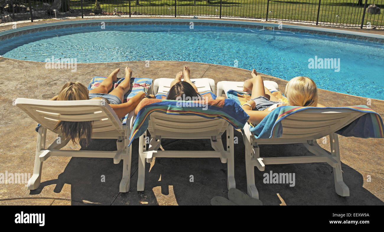 Towels on chairs at pool hires stock photography and images Alamy