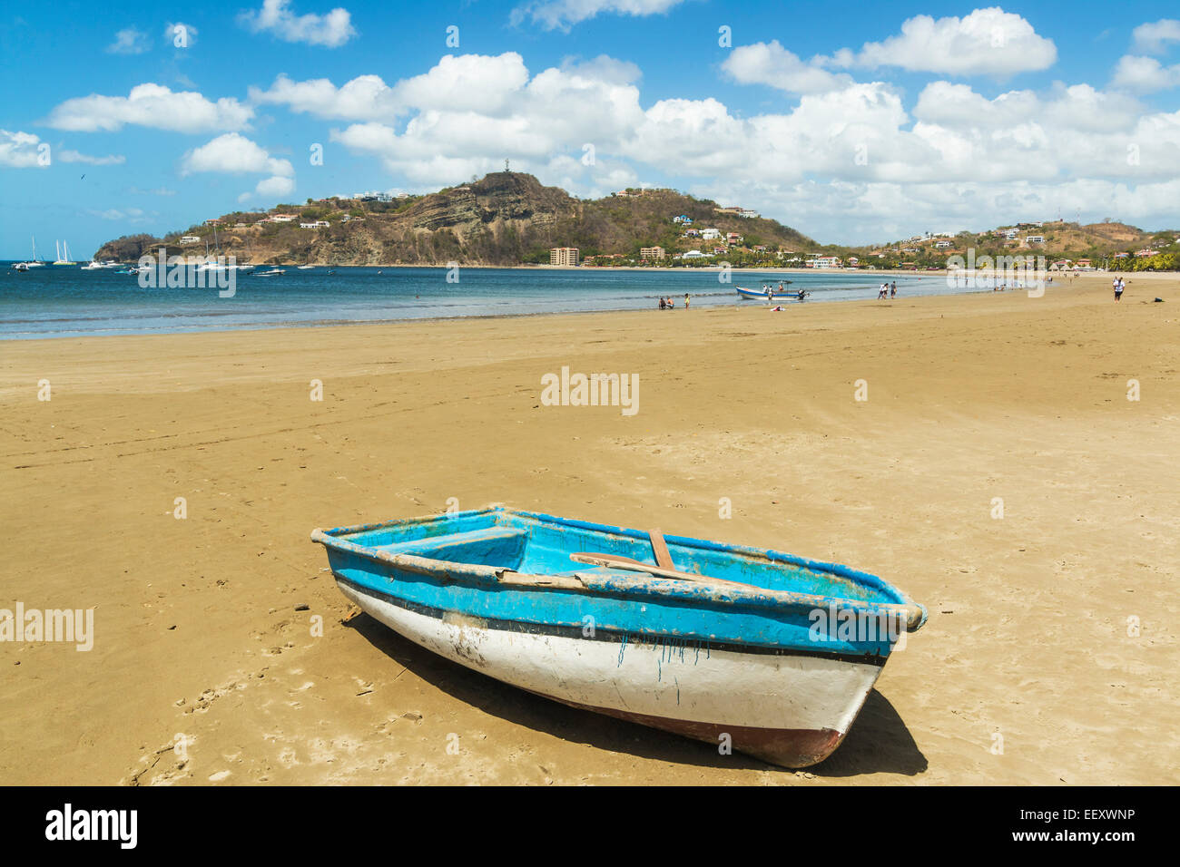 Little boat on the beach at this popular tourist hub for the southern surf beaches; San Juan del Sur, Rivas Province, Nicaragua Stock Photo