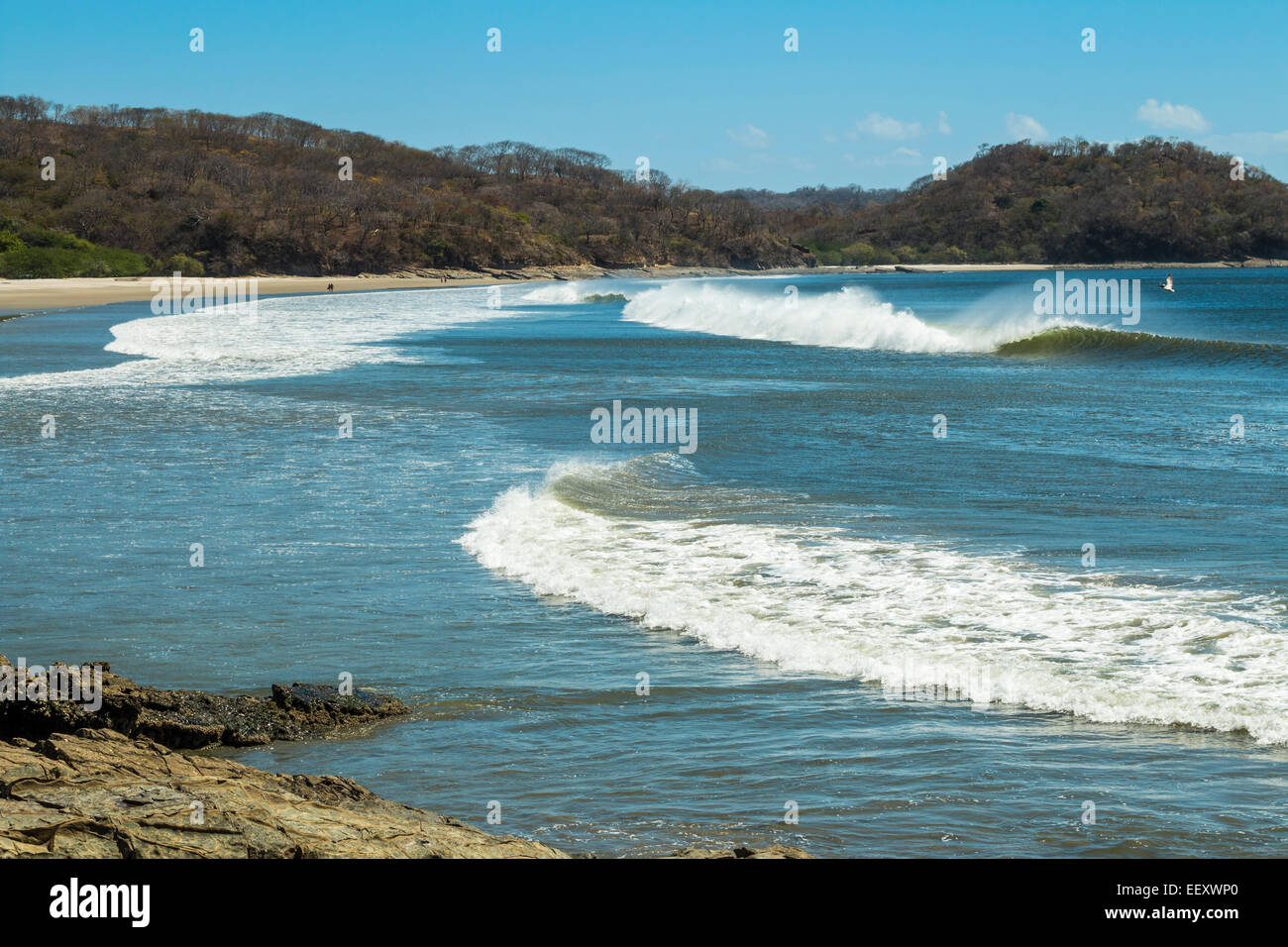Surf wave at beautiful Playa El Coco beach south of San Juan del Sur; Playa El Coco, San Juan del Sur, Rivas Province, Nicaragua Stock Photo