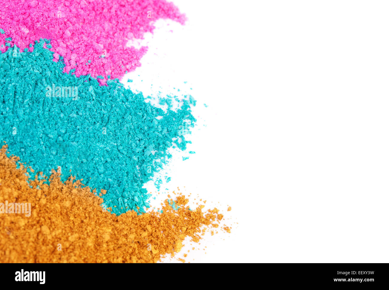 Crushed colored eyeshadow on a white background Stock Photo