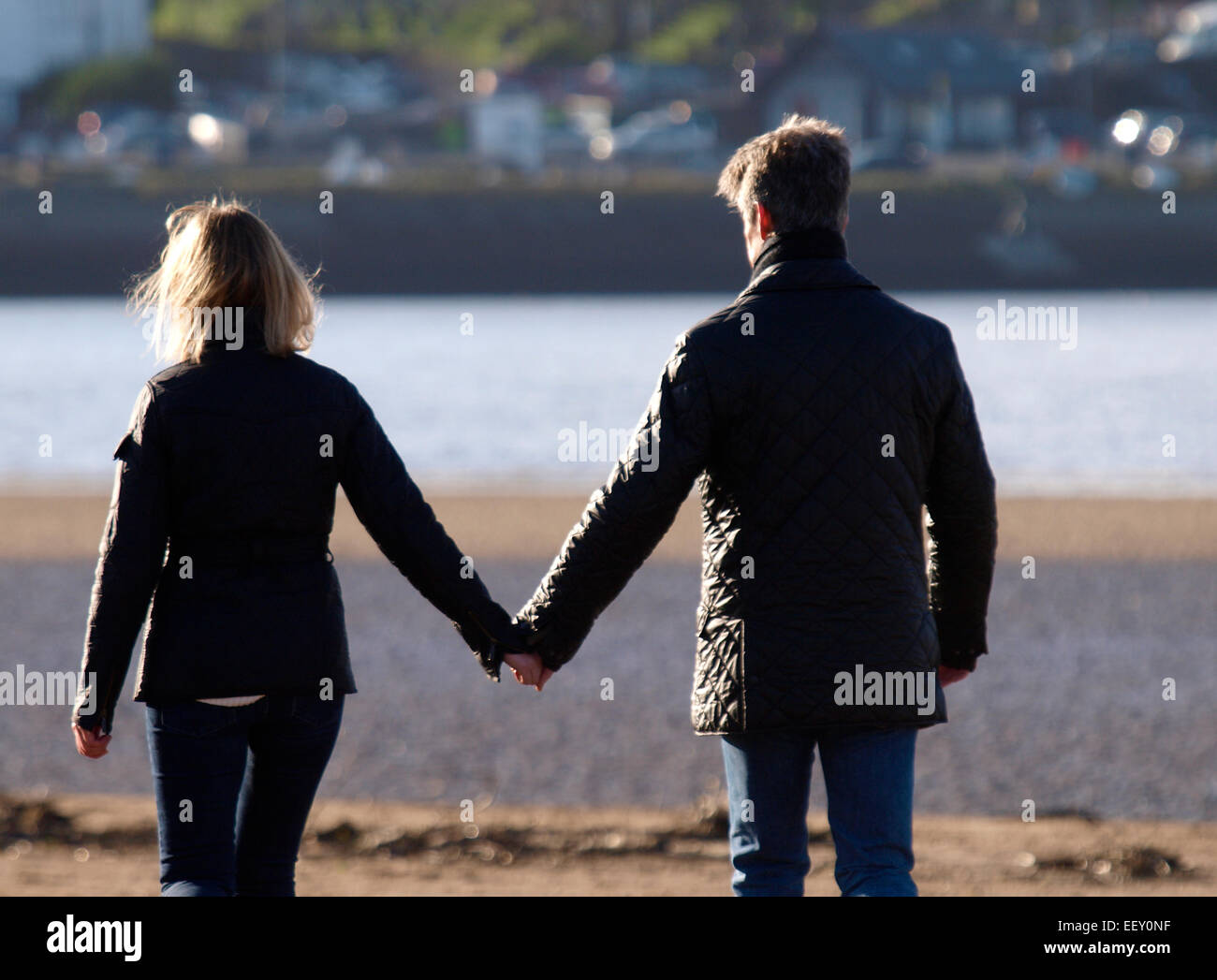 Middle aged couple holding hands, Devon, UK Stock Photo