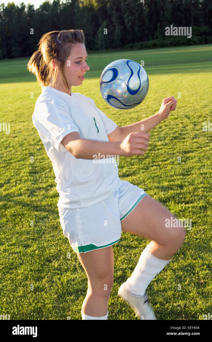 Girl playing soccer Stock Photo