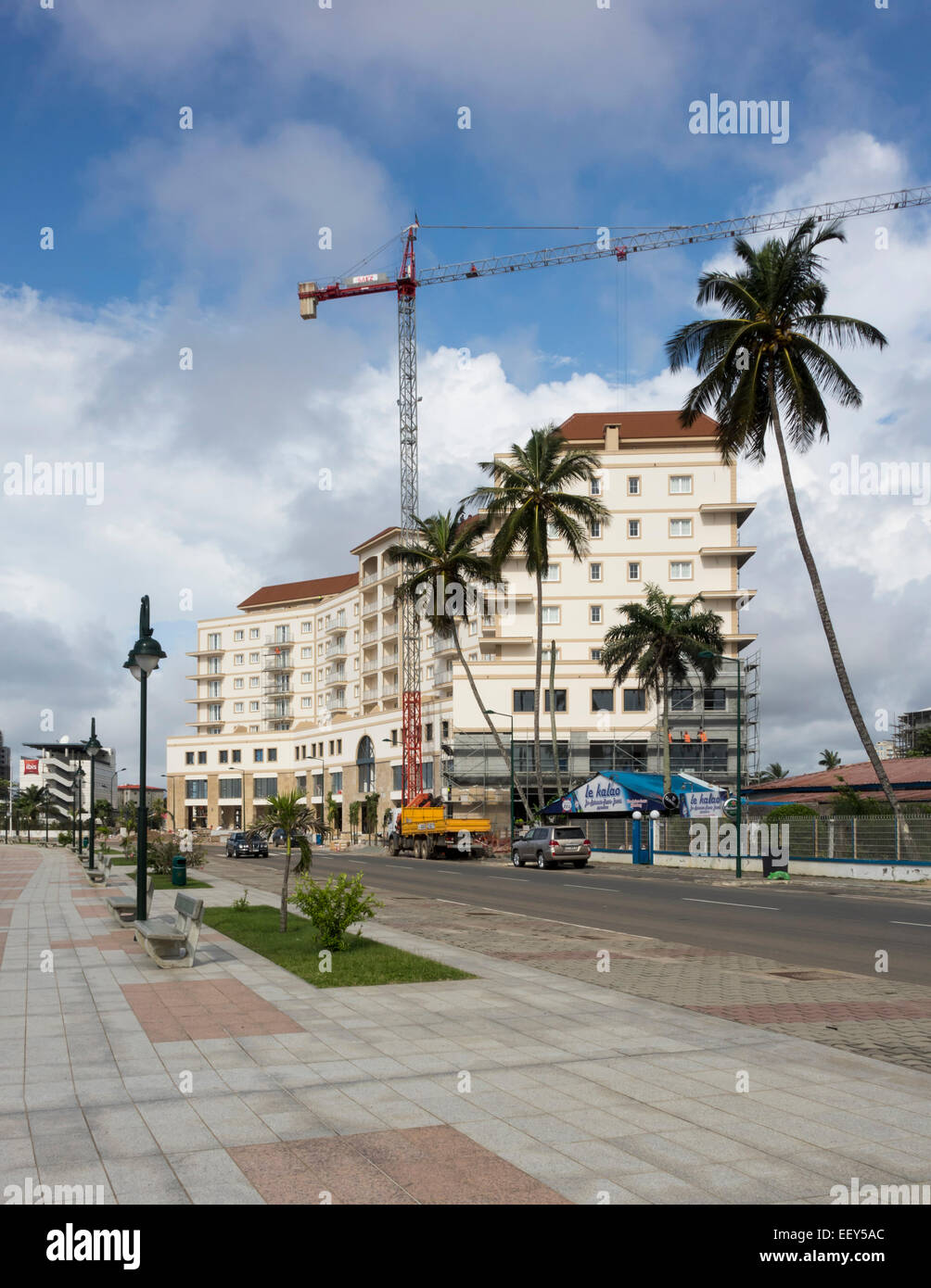 Building exterior of large new apartment or hotel building under construction in Bata, Equatorial Guinea, West Africa Stock Photo