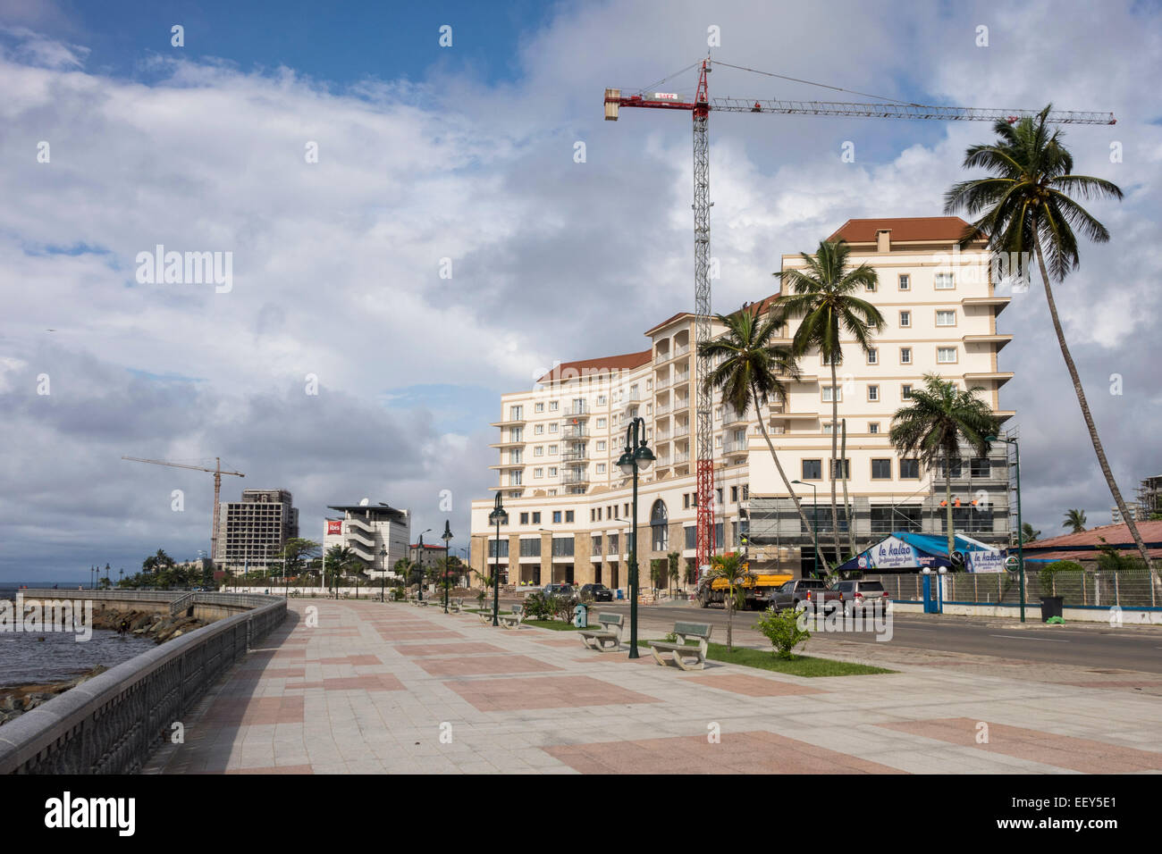 Building exterior of large new apartment or hotel building under construction in Bata, Equatorial Guinea, Africa Stock Photo