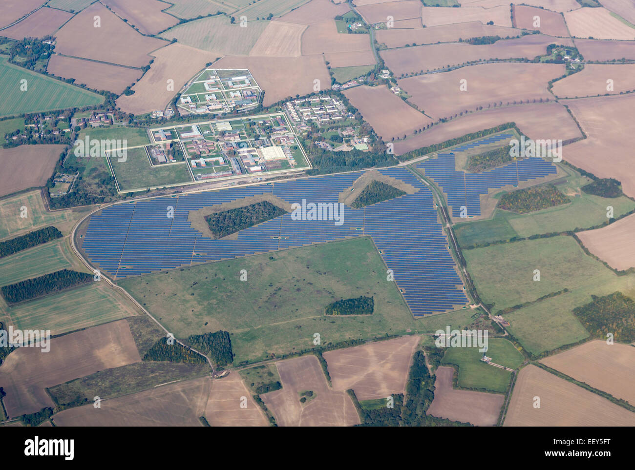 Large solar panel array in fields around Highpoint Prison near Newmarket, England Stock Photo