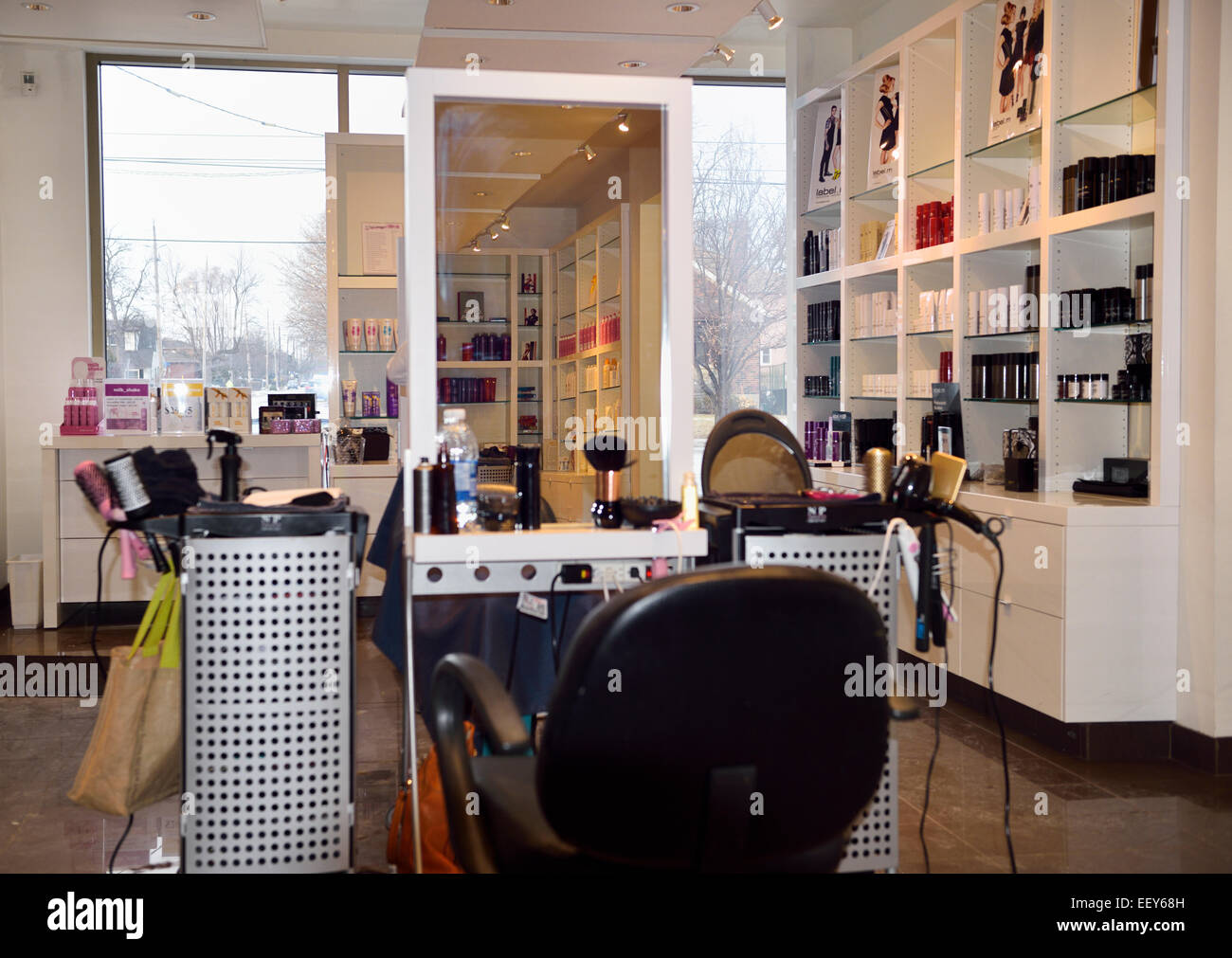 Beauty products on shelves of a hair salon in winter Stock Photo
