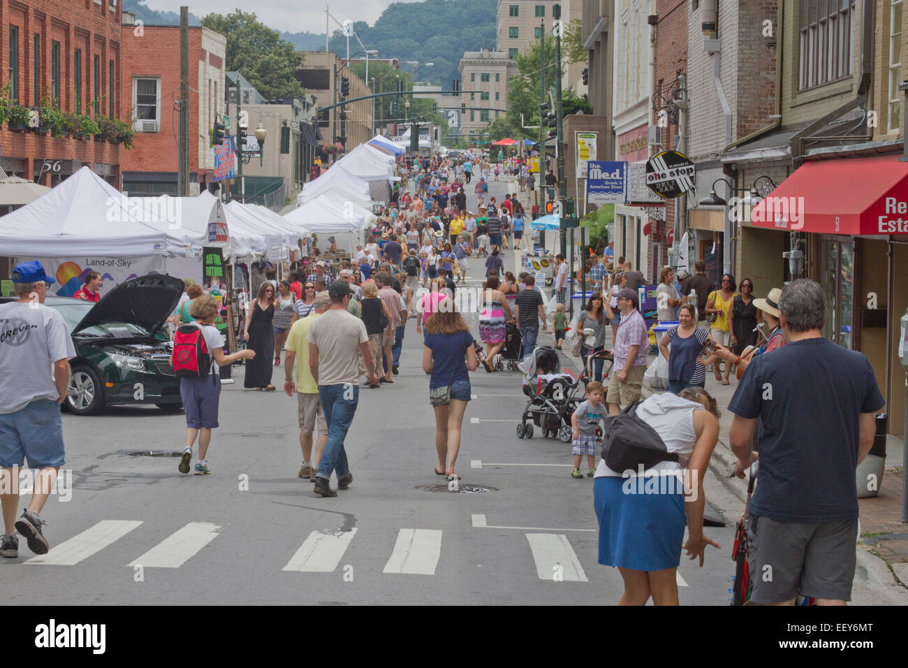 A summer street scene of the now discontinued Bele Chere Music Festival in  downtown Asheville, NC Stock Photo - Alamy
