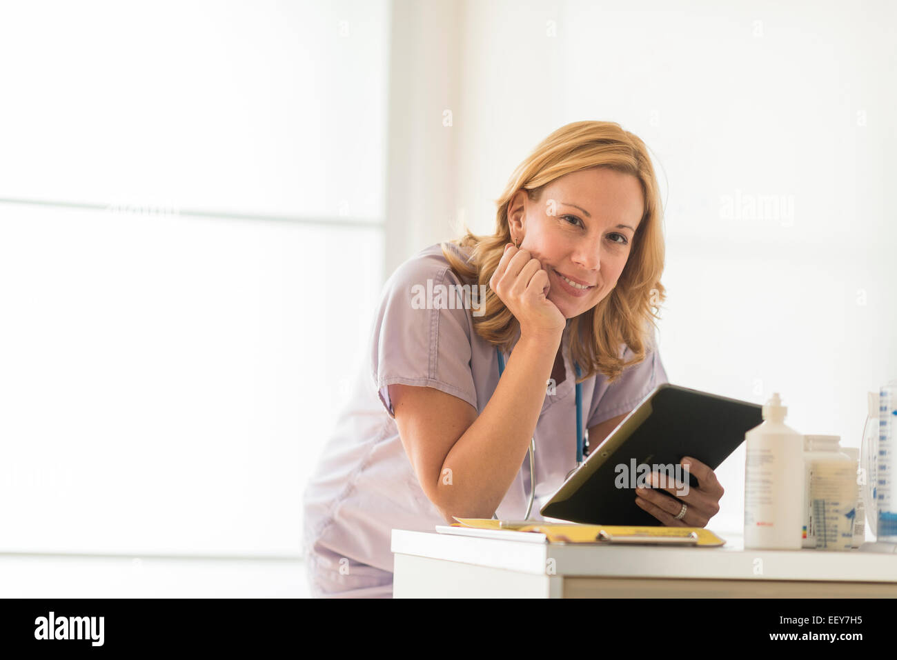 Female doctor using tablet pc Stock Photo