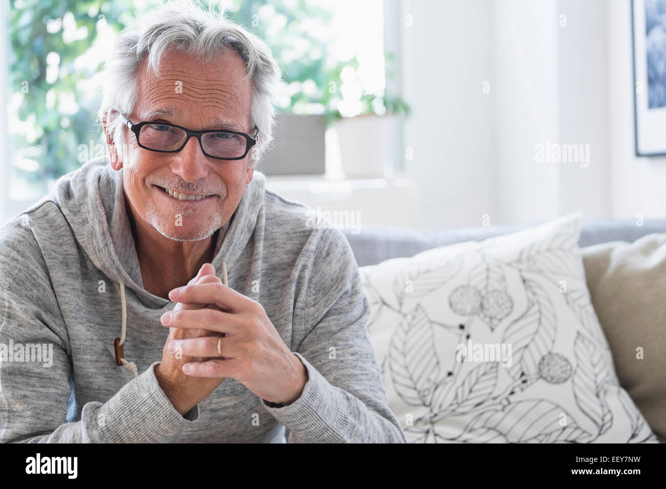 Portrait of smiling senior man Stock Photo