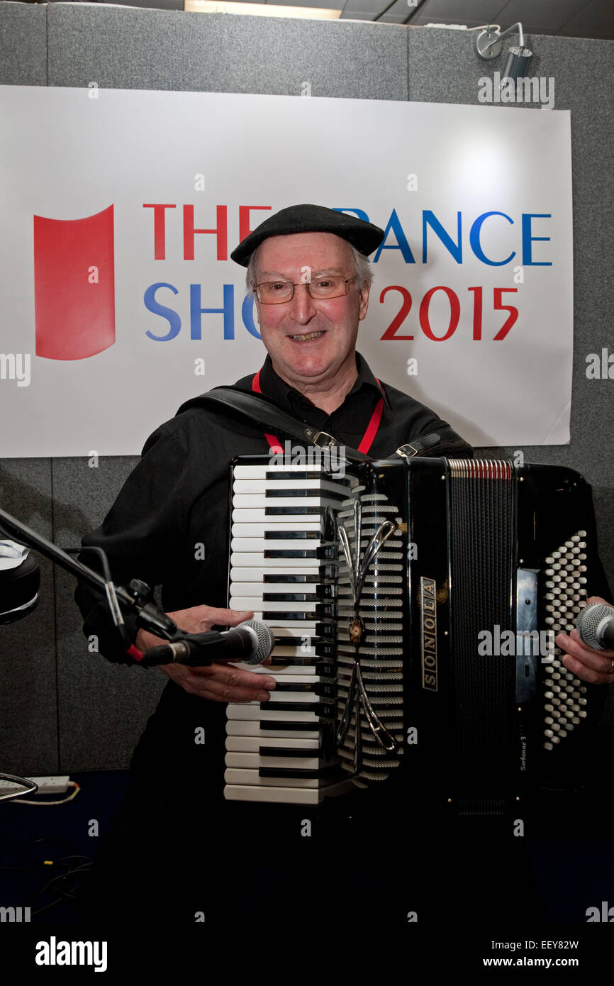 An accordian player at the France Show 2015 in Olympia London Stock Photo