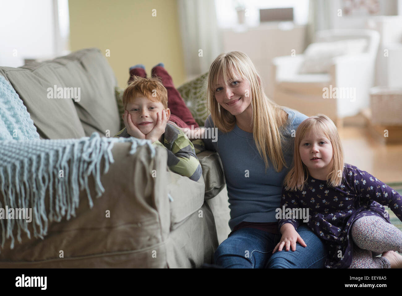 Portrait of happy mother with children (4-5, 6-7) Stock Photo